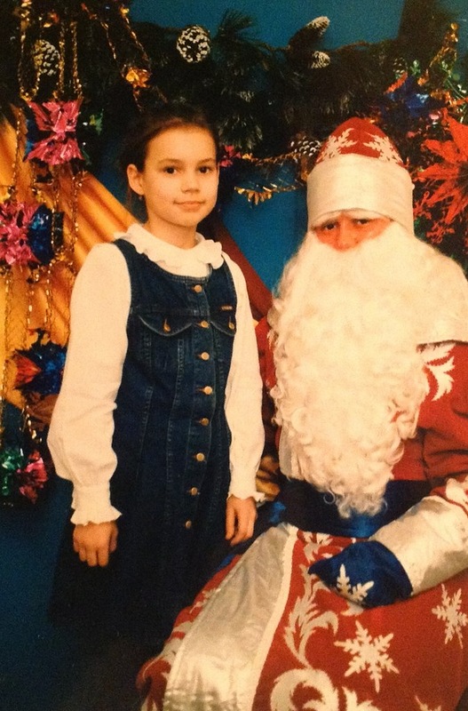 Elina Kireeva in childhood and Ded Moroz. photo